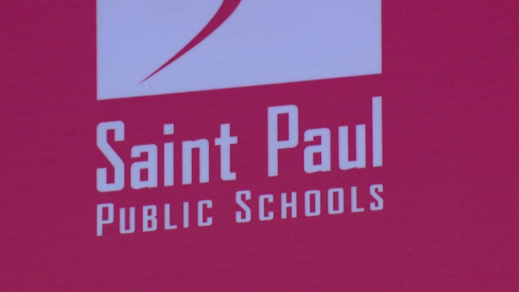 St. Paul Public Schools building exterior with diverse students walking by