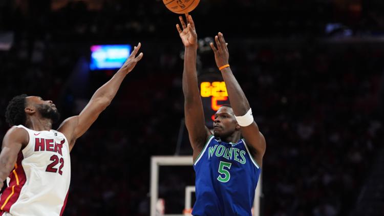 Anthony Edwards in action, dribbling basketball on court for Minnesota Timberwolves